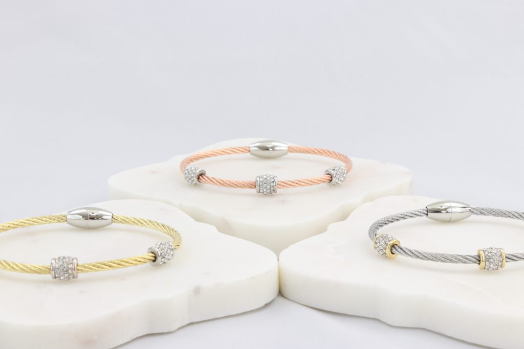 Twisted cable bracelet with barrel-clusters of synthetic diamonds and magnetic clasp Ivy and Pearl Boutique