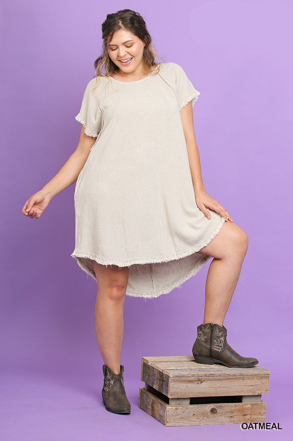 Umgee linen round-neck pocket dress with fringe short sleeves and high-low hem Ivy and Pearl Boutique