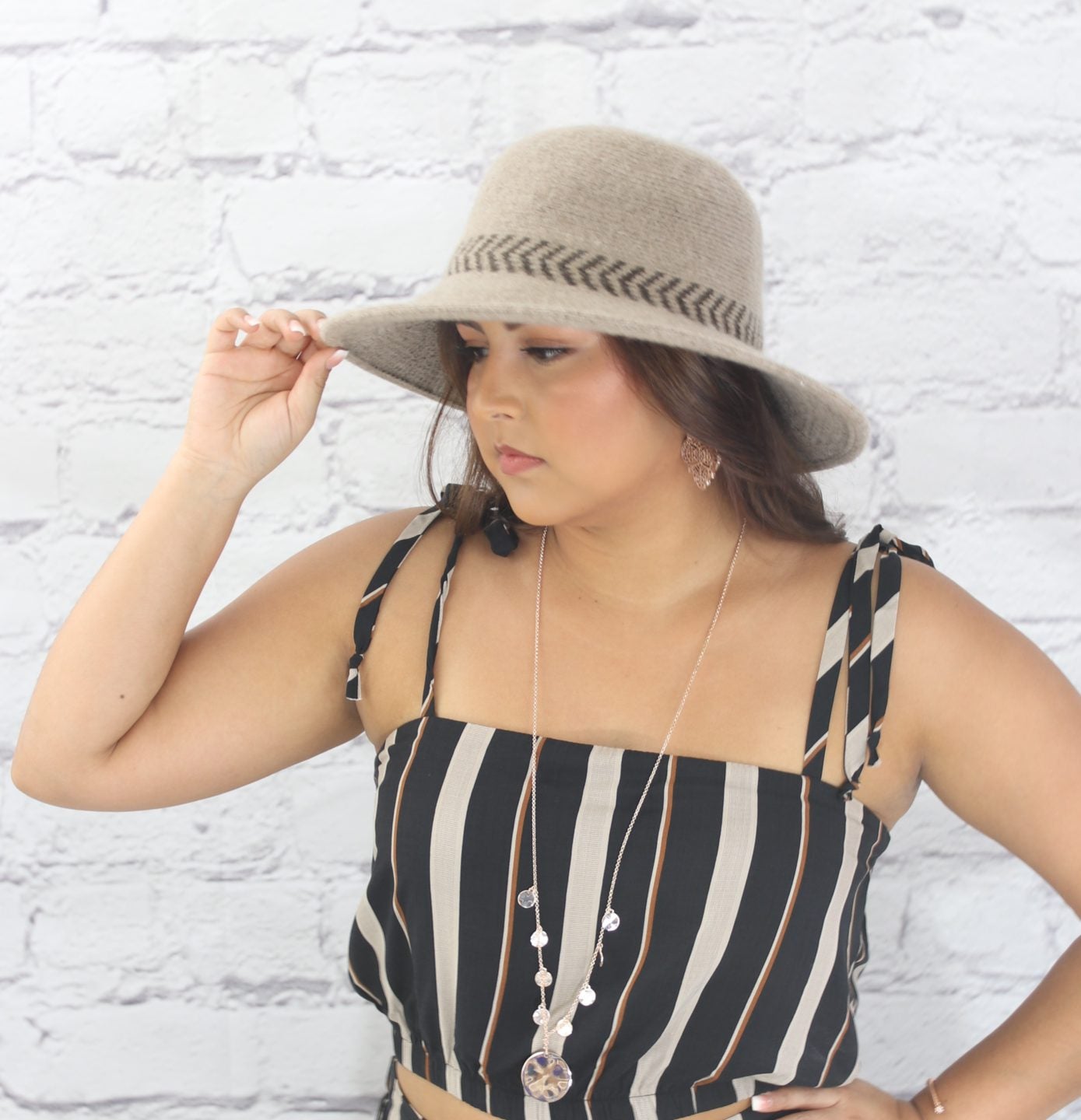 Stylish wool cloche hat with tucked tie rope Ivy and Pearl Boutique