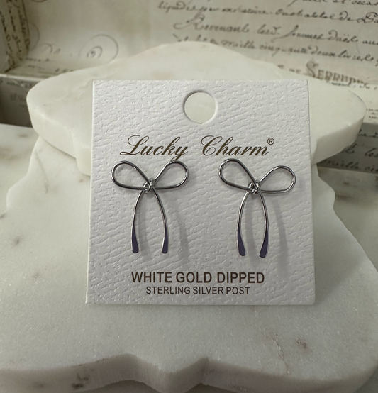 Lucky Charm silver bow earrings Earrings Dallas Market Center