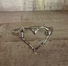 Heart hinged metal bracelet