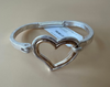 Heart hinged metal bracelet