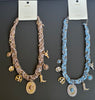 Scarf necklace with charms