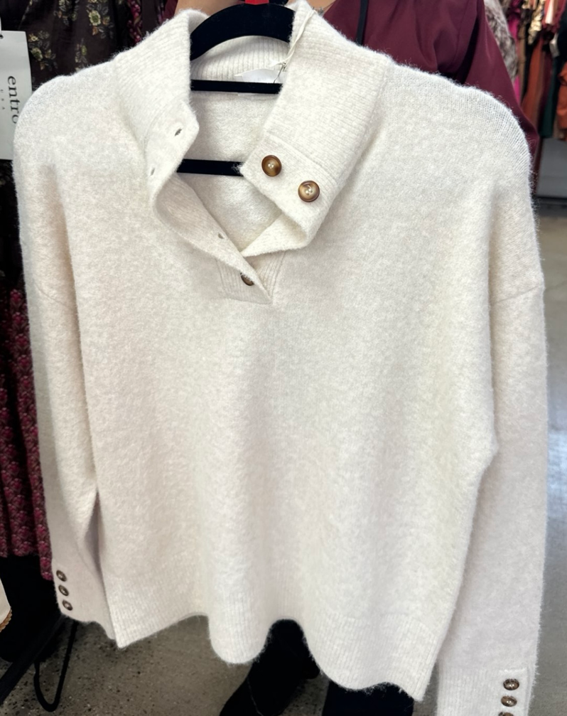Solid long sleeve sweater knit top w/button placket and cuffs