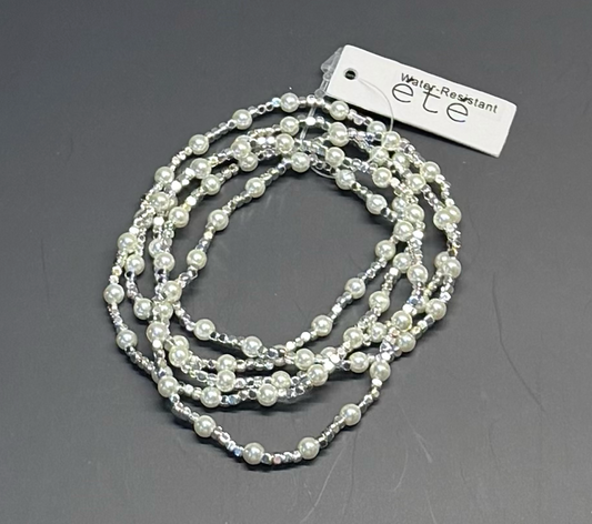 Five-set silver, white and pearl water resistant bracelets