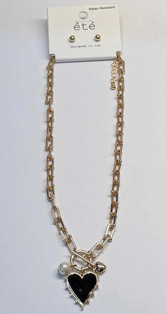 Gold hoop with gold and black heart necklace and gold bead earrings set