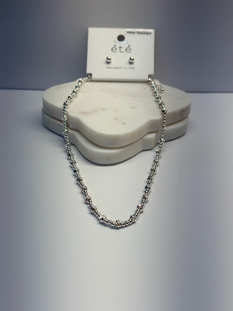 Silver large decorative and small bead necklace