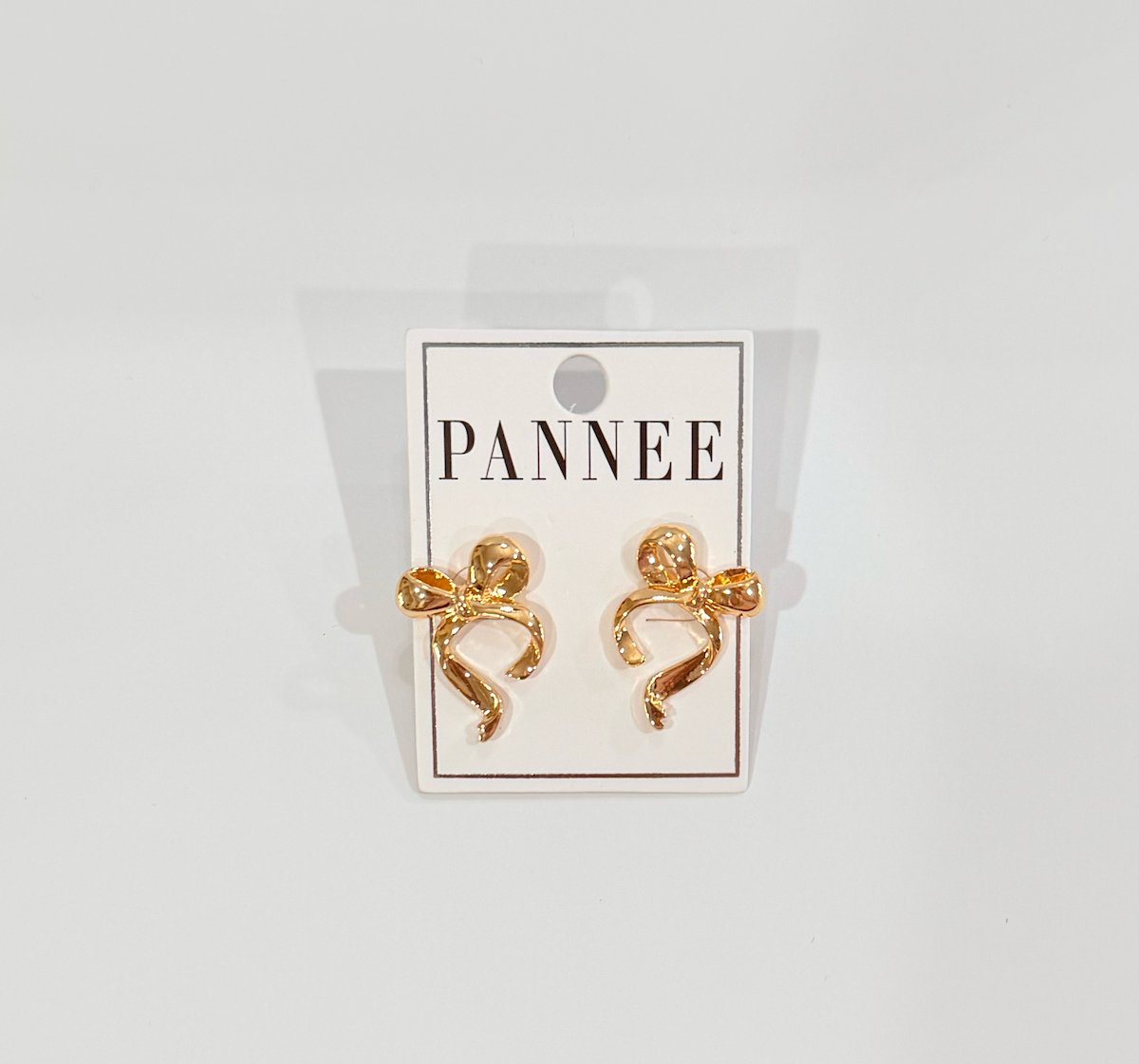Pannee gold bow earrings