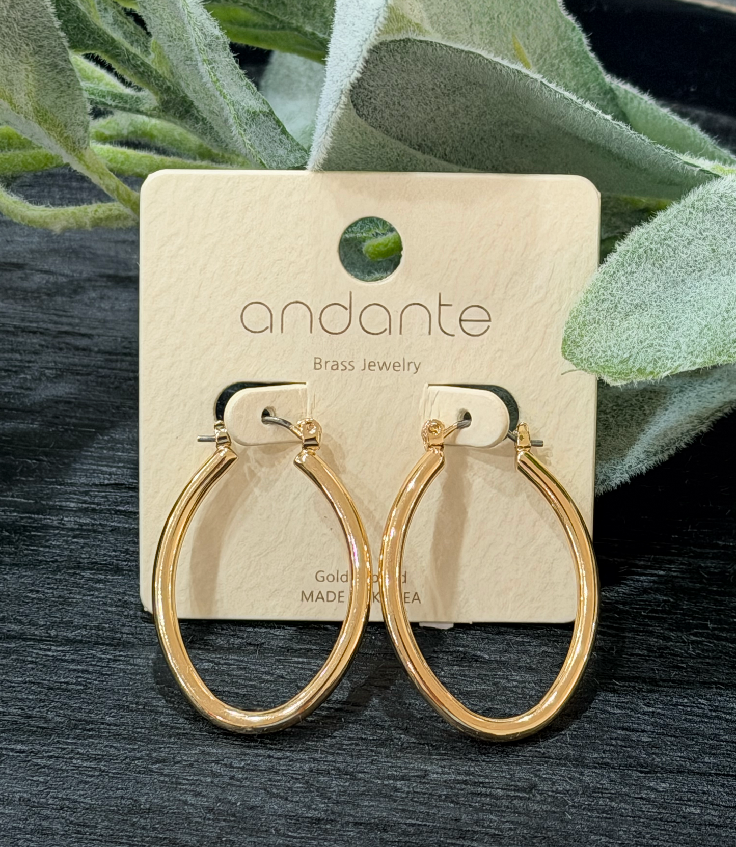 Gold toned oval hoop earrings