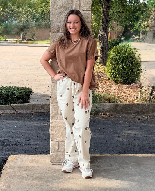 Polka dot drawstring pants with elastic waistband and side and back pockets