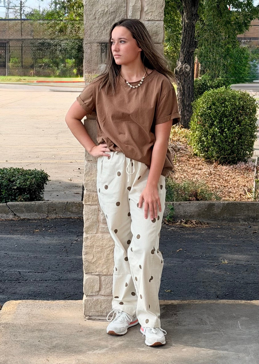 Polka dot drawstring pants with elastic waistband and side and back pockets
