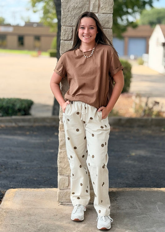 Polka dot drawstring pants with elastic waistband and side and back pockets