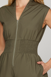 Cap sleeve woven smocked waist front zip romper with pockets