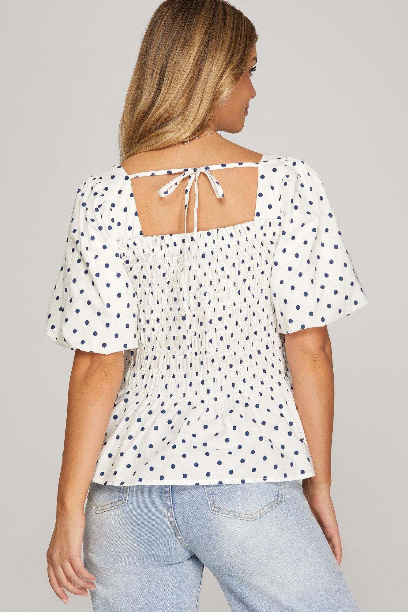 Puff half sleeve polka dot woven smocked peplum top