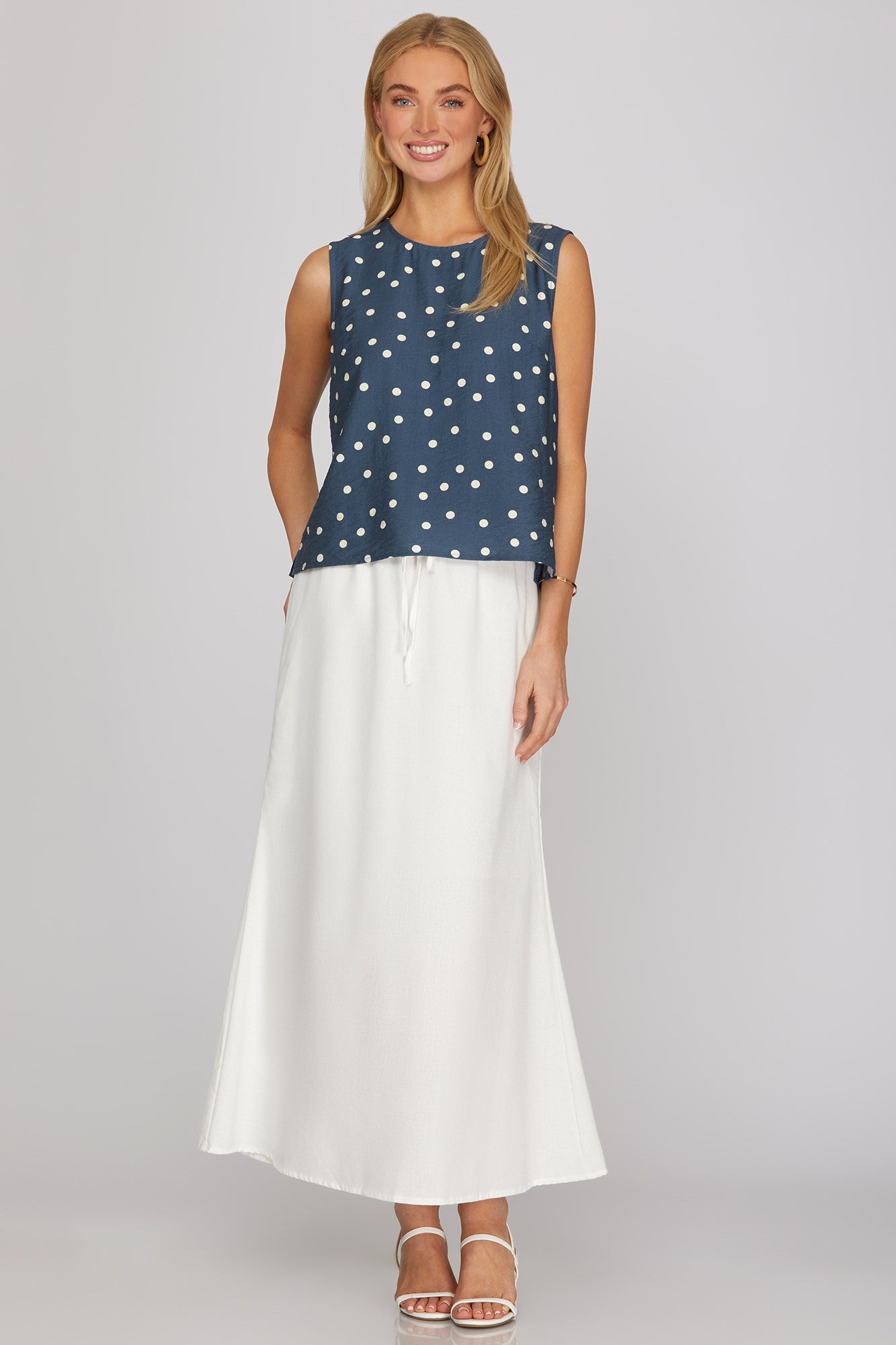 Sleeveless woven polka dot print top