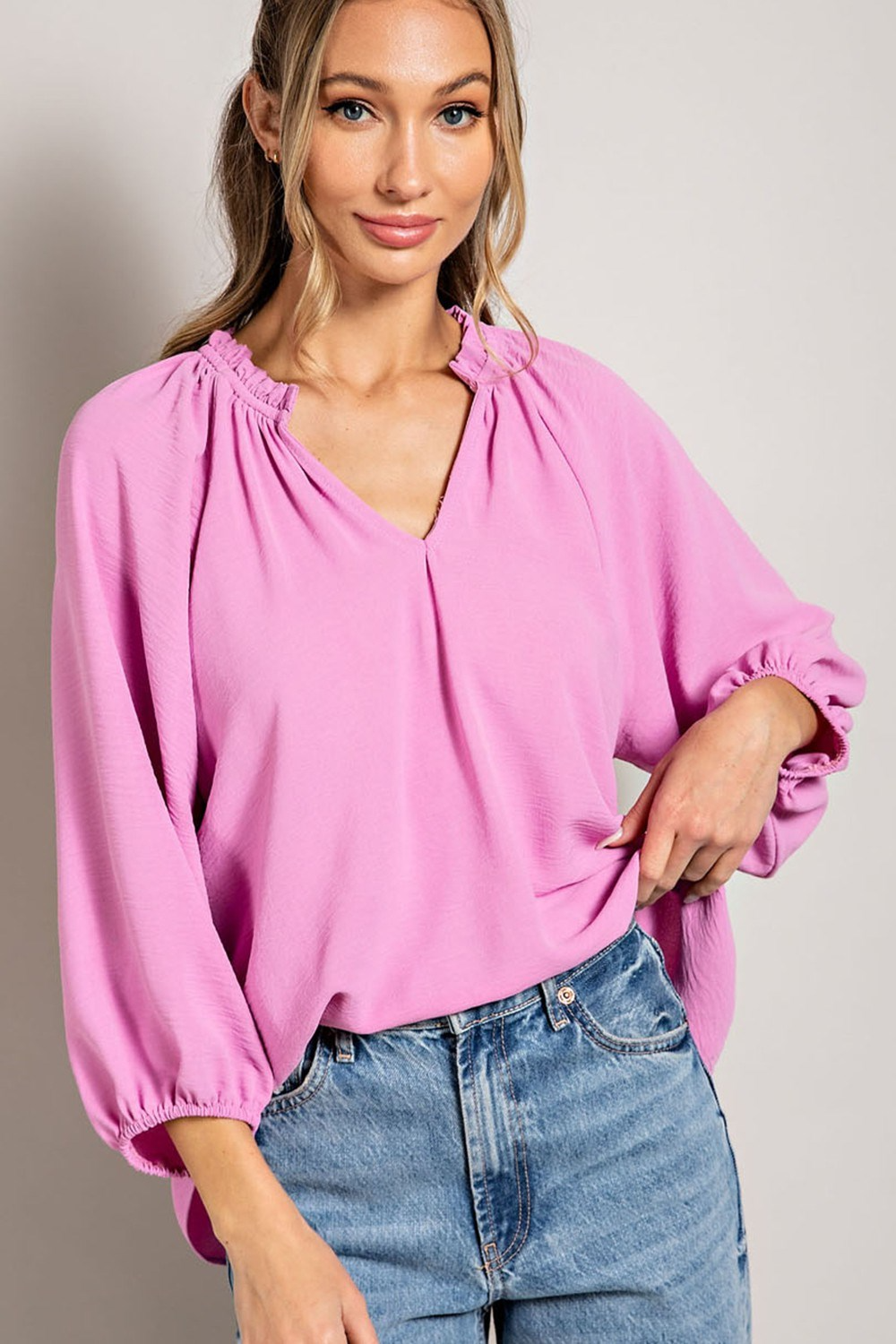 Blouse top with 3/4 puff sleeves and ruffled collar