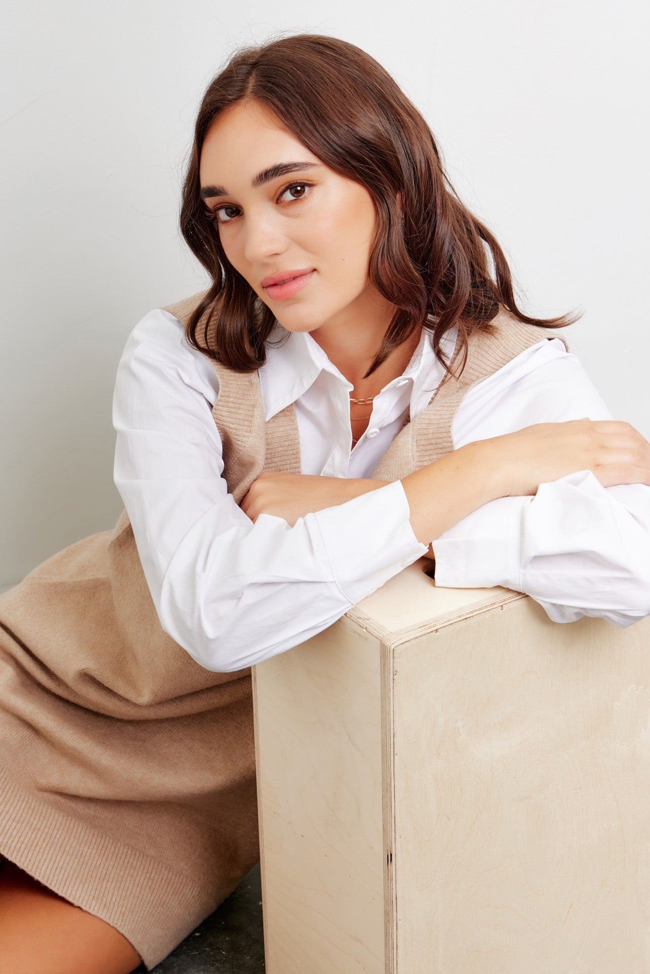 Mixed media mini sweater dress with layered shirt