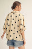Drop shoulder polka dot satin top with collared neckline.