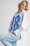 Faded varsity print long sleeve pullover top