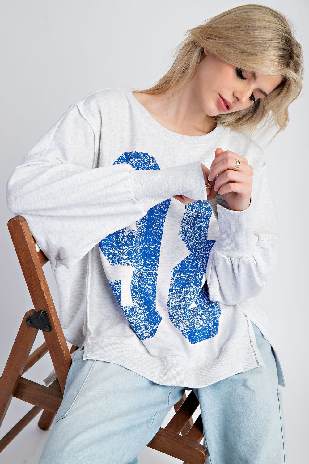 Faded varsity print long sleeve pullover top