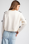 Ribbon point long sleeve sweater