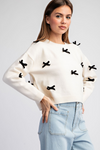 Ribbon point long sleeve sweater