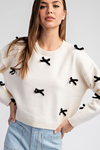 Ribbon point long sleeve sweater