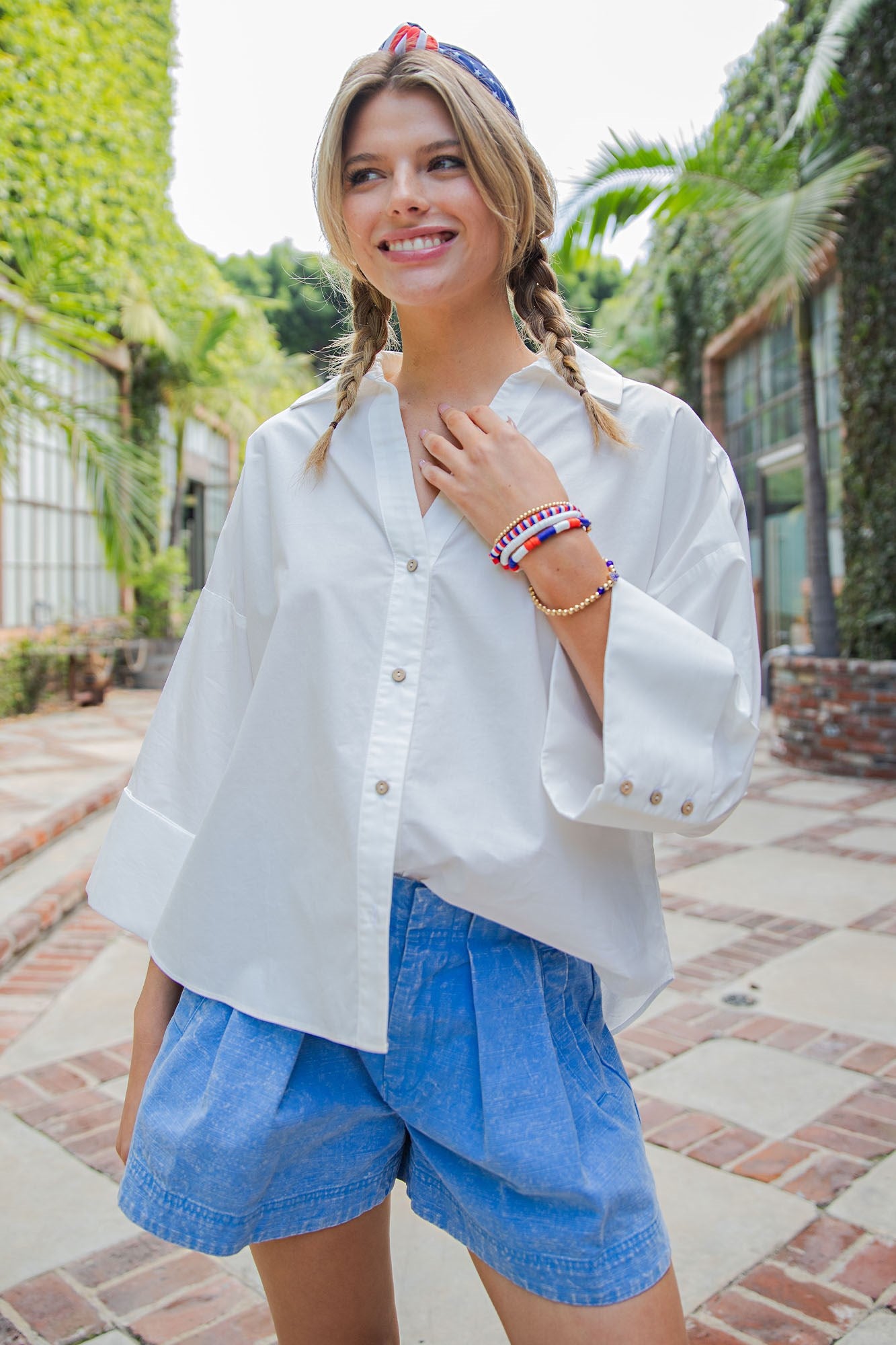 Back pleat button down blouse top