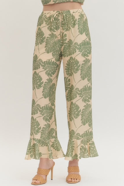 Botanical print wide leg pants featuring elasticated waistband with drawstring tie