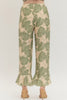 Botanical print wide leg pants featuring elasticated waistband with drawstring tie
