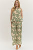 Botanical print sleeveless top featuring ruffle hem detail