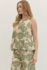 Botanical print sleeveless top featuring ruffle hem detail