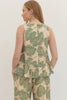Botanical print sleeveless top featuring ruffle hem detail