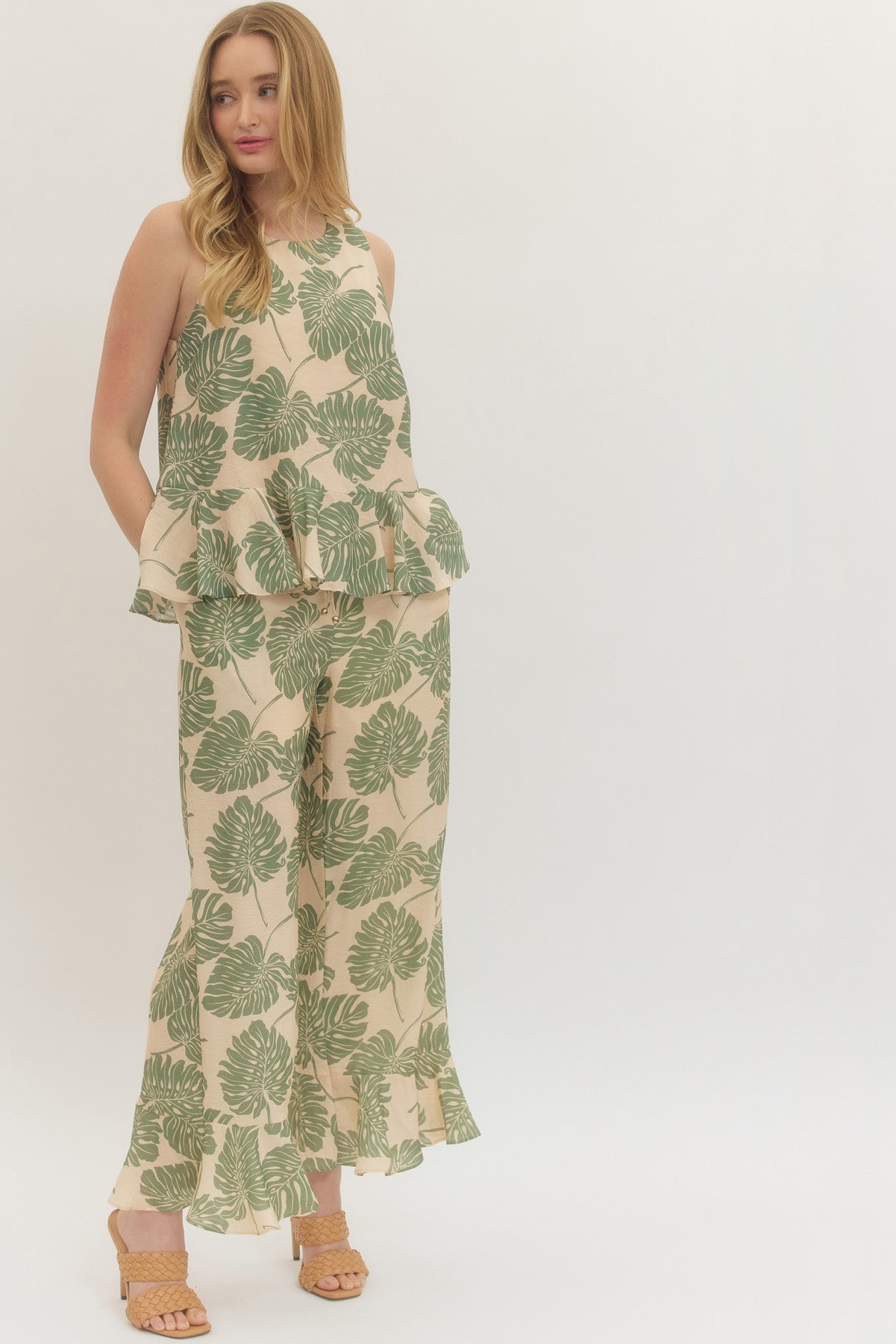 Botanical print wide leg pants featuring elasticated waistband with drawstring tie