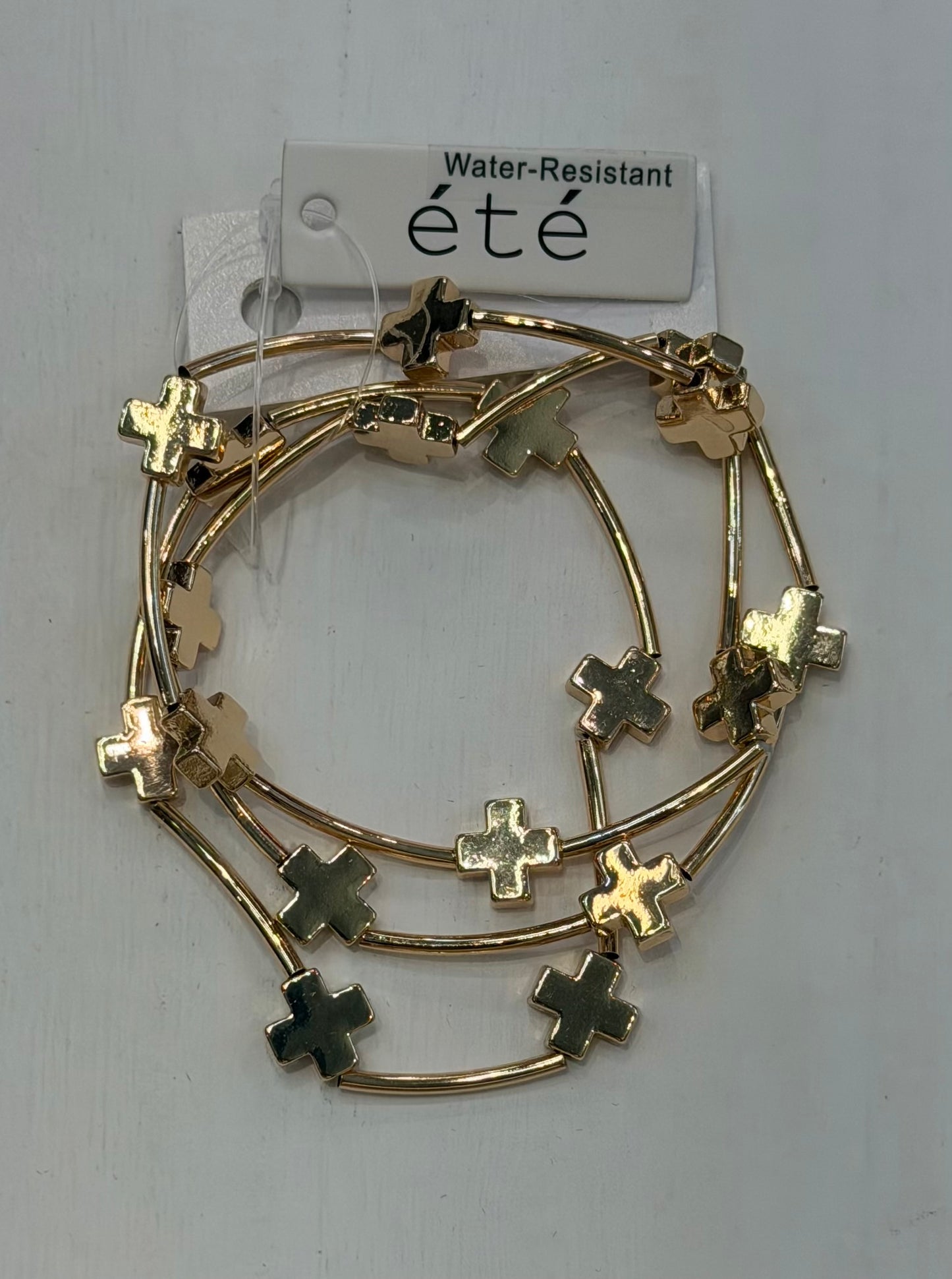 Tiny gold cross bracelets