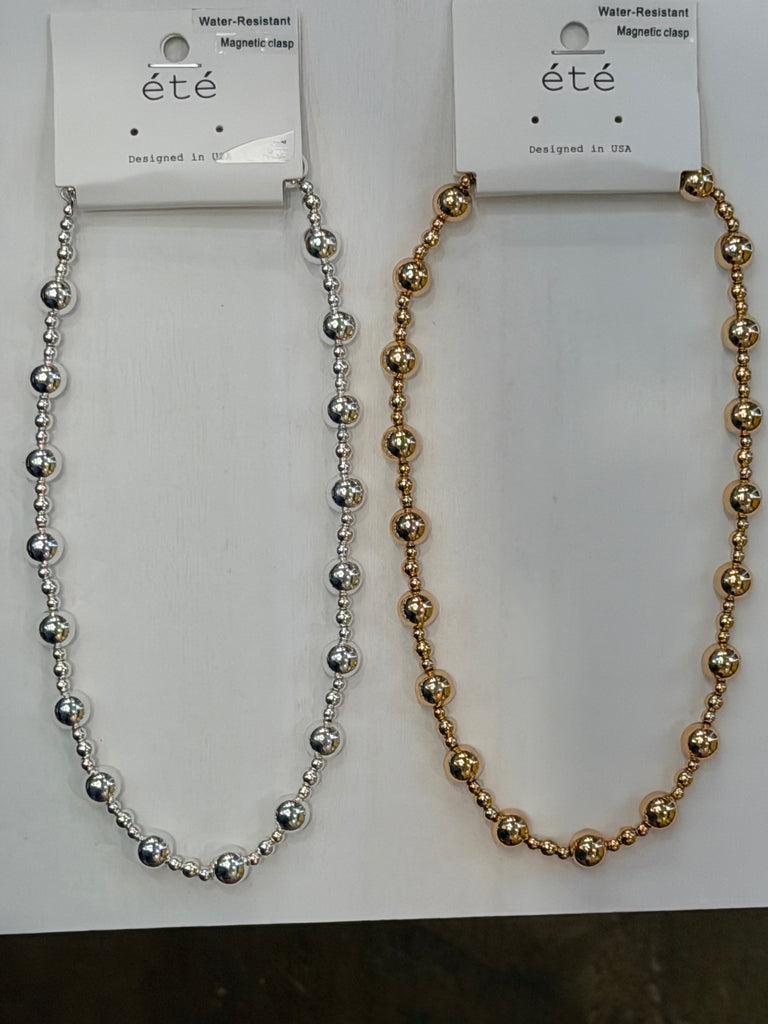 Large and small beaded necklaces