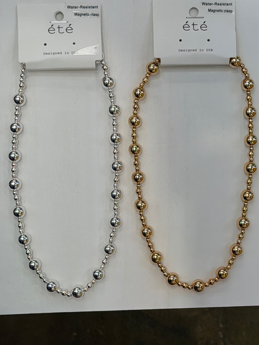 Large and small beaded necklaces