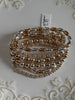 Water resistant gold and silver horsebit beaded bracelet set