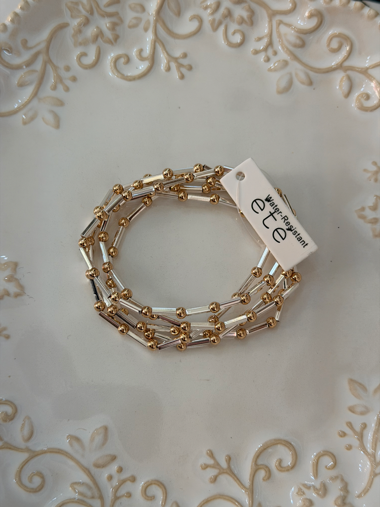 Water resistant rods and beads stacked bracelet