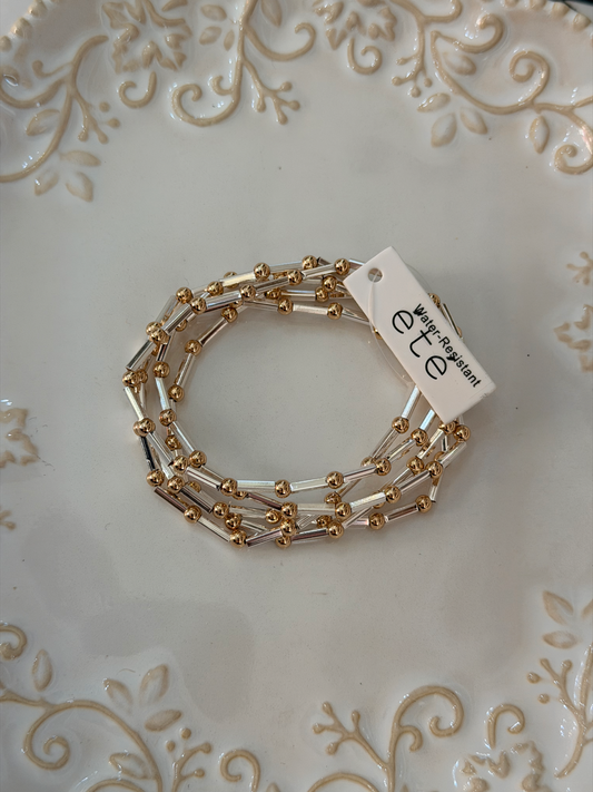 Water resistant rods and beads stacked bracelet