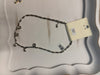 Necklace featuring a barrel links and chunky decorative gemstones