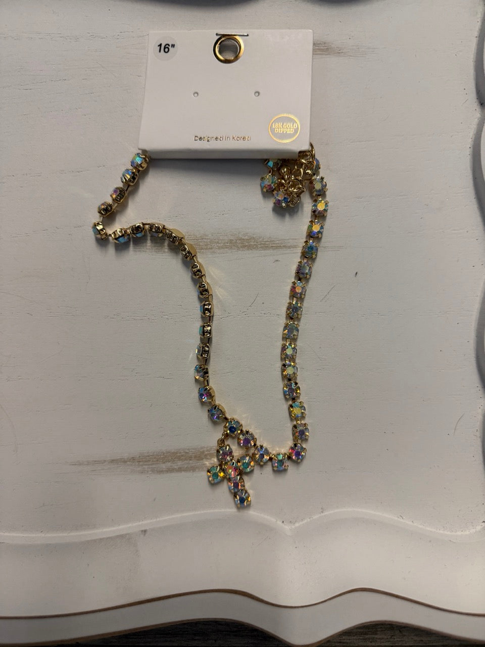 Gem necklace with gemmed cross