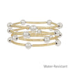 Water Resistant Set of 4 Gold Piping and Stretch Bracelets