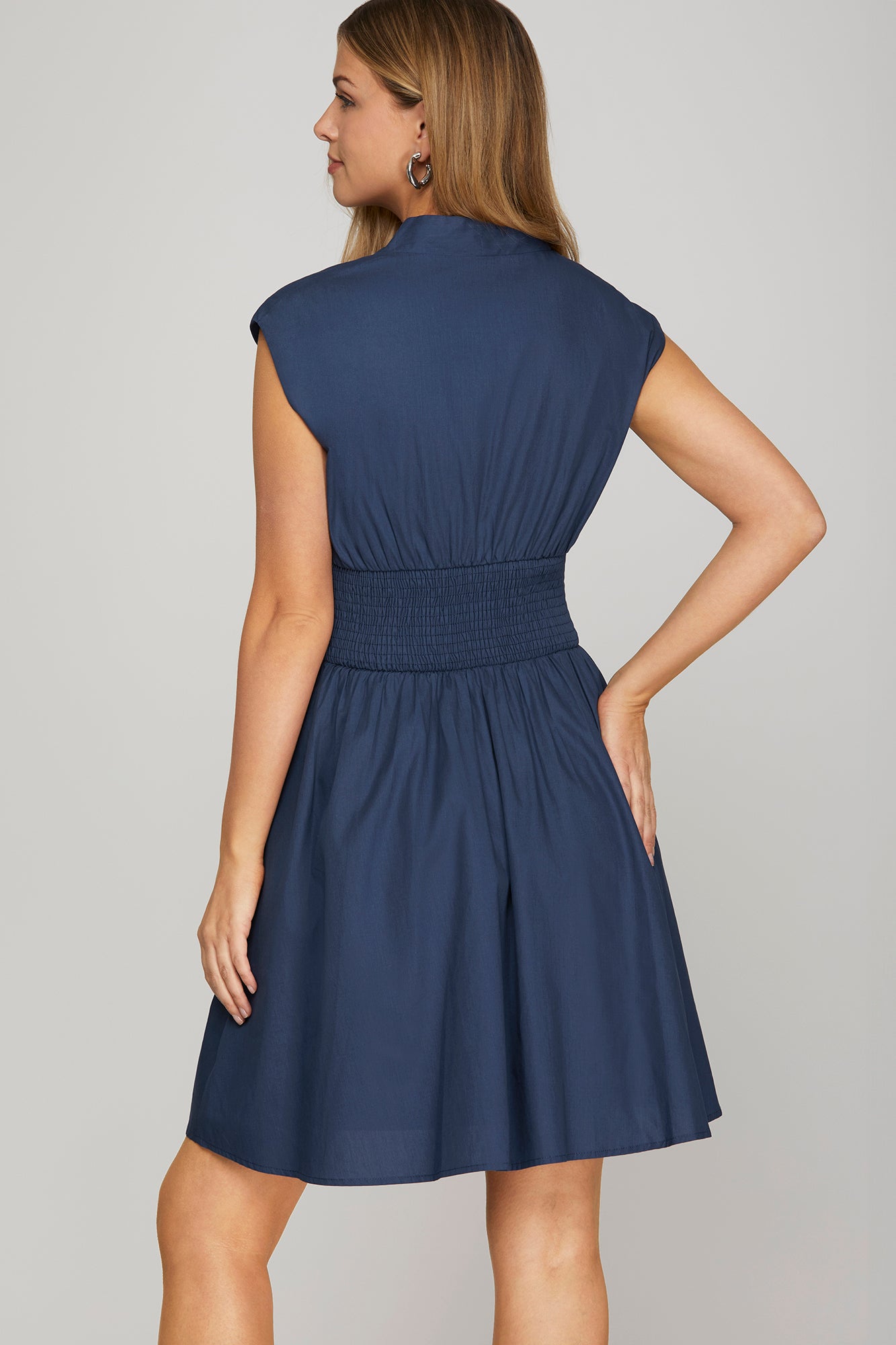 Drop shoulder smocked waist front zip mini dress with pockets