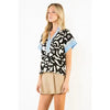 Abstract print top with denim trim
