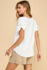 Solid top with knot detailed sleeves