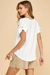 Solid top with knot detailed sleeves