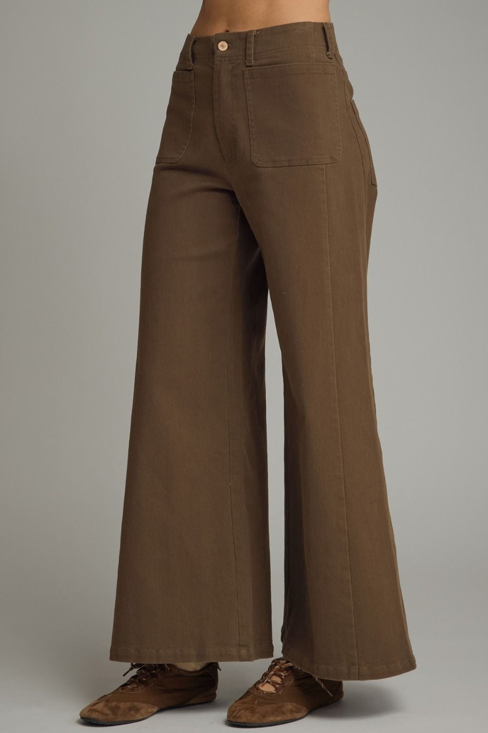 Solid knit wide leg pants featuring front pockets