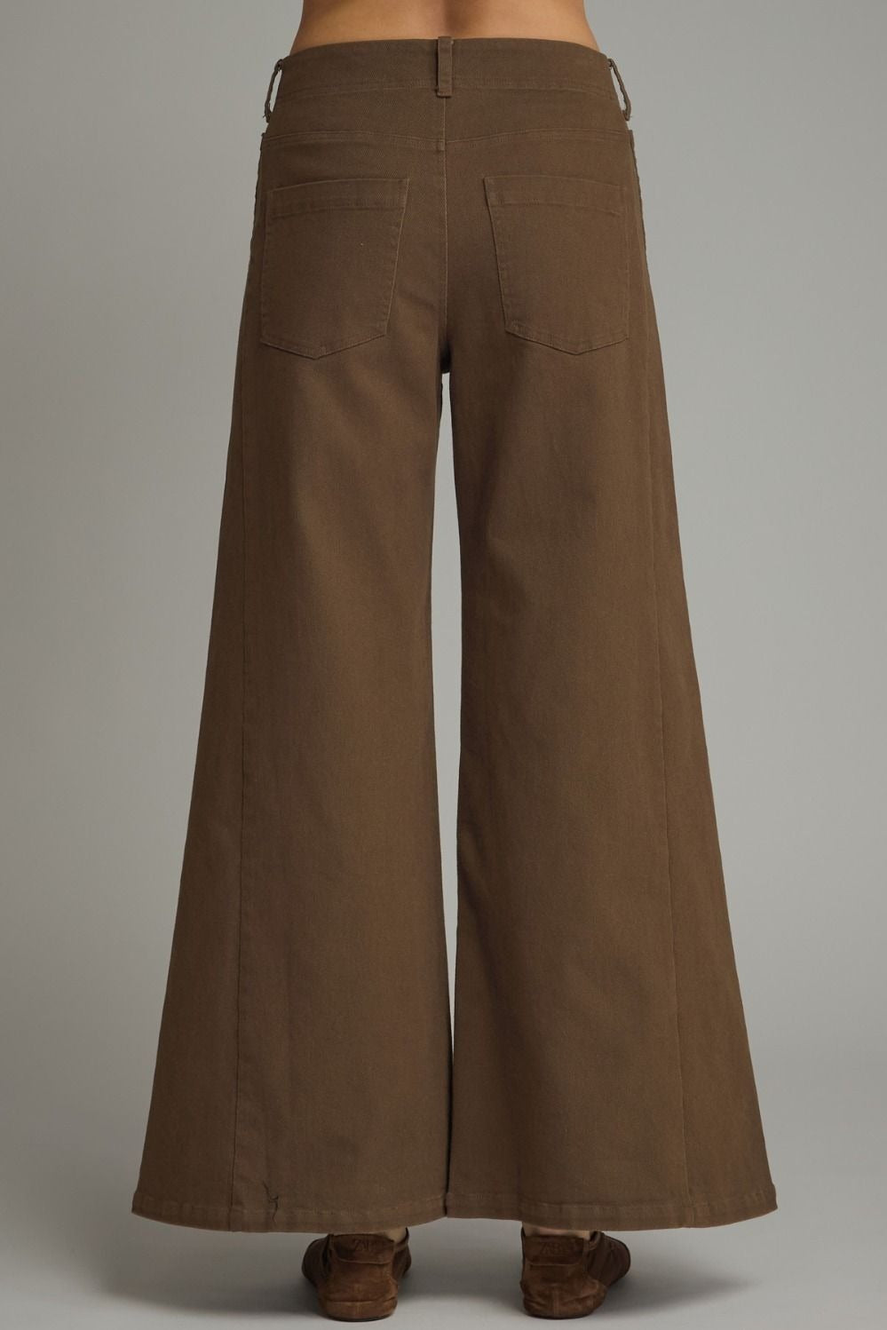 Solid knit wide leg pants featuring front pockets