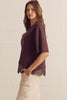 Solid short sleeve knit top featuring scallop lace hem detail